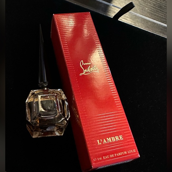Christian Louboutin Accessories - Christuan loubutin new with box L' Ambre .